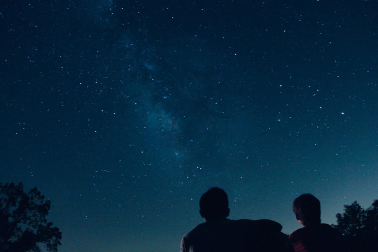 Children gazing at stars